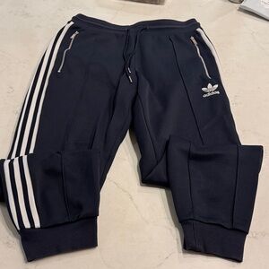 Adidas Dark Blue Joggers with sewn in crease White Stripes
